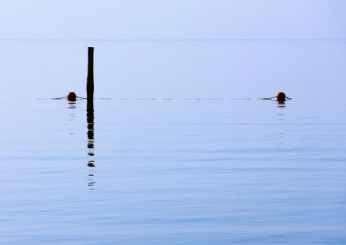 CALM SEA REFLECTION by-Janice-Kennaway